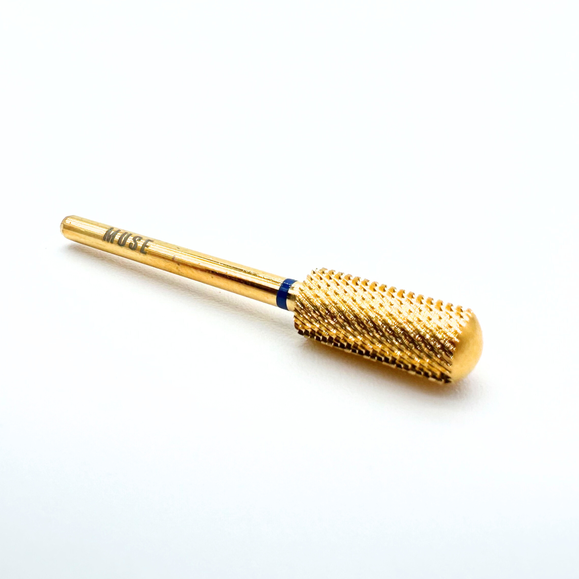 Gold cylindrical tool with textured end on a white background