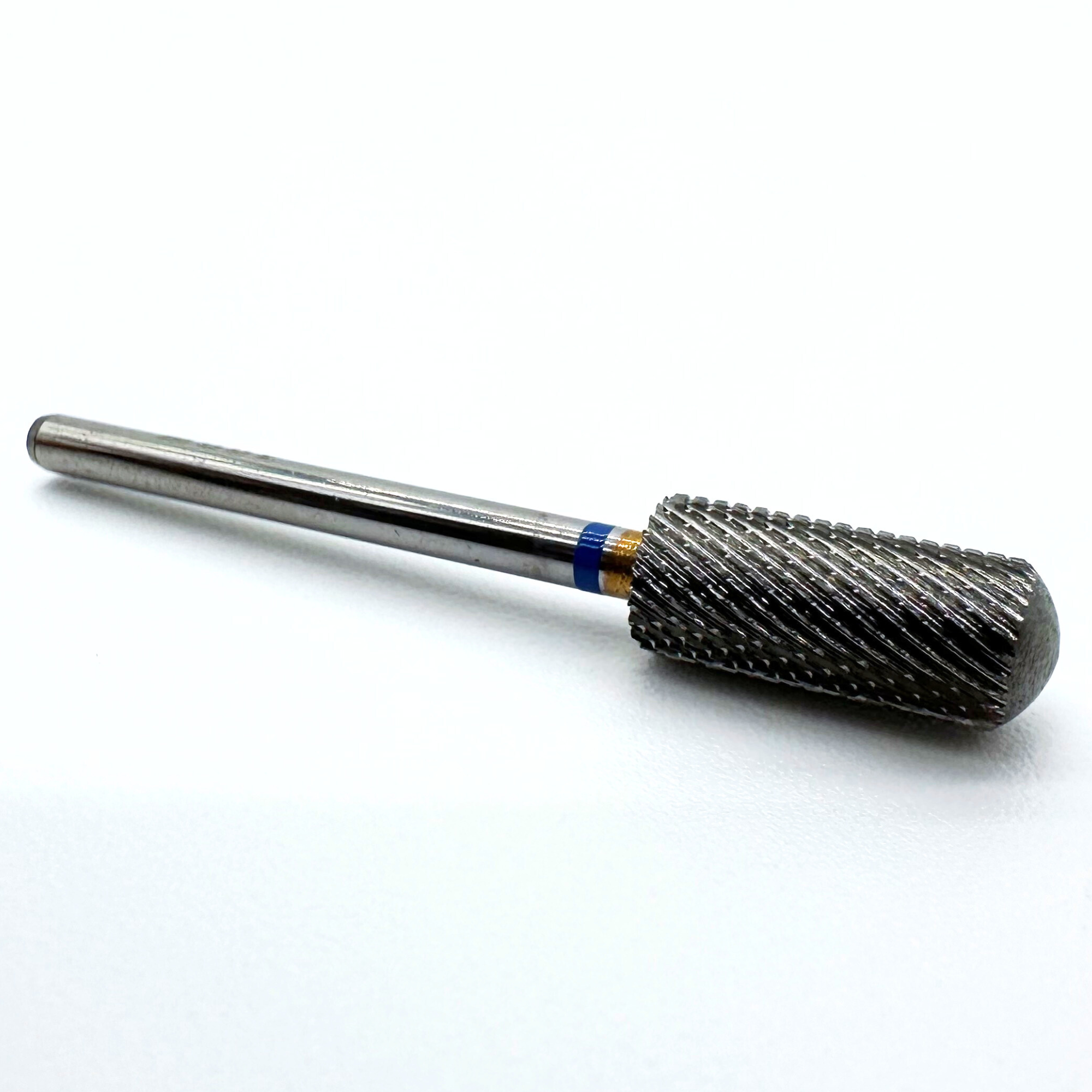 Nail drill bit on a white background