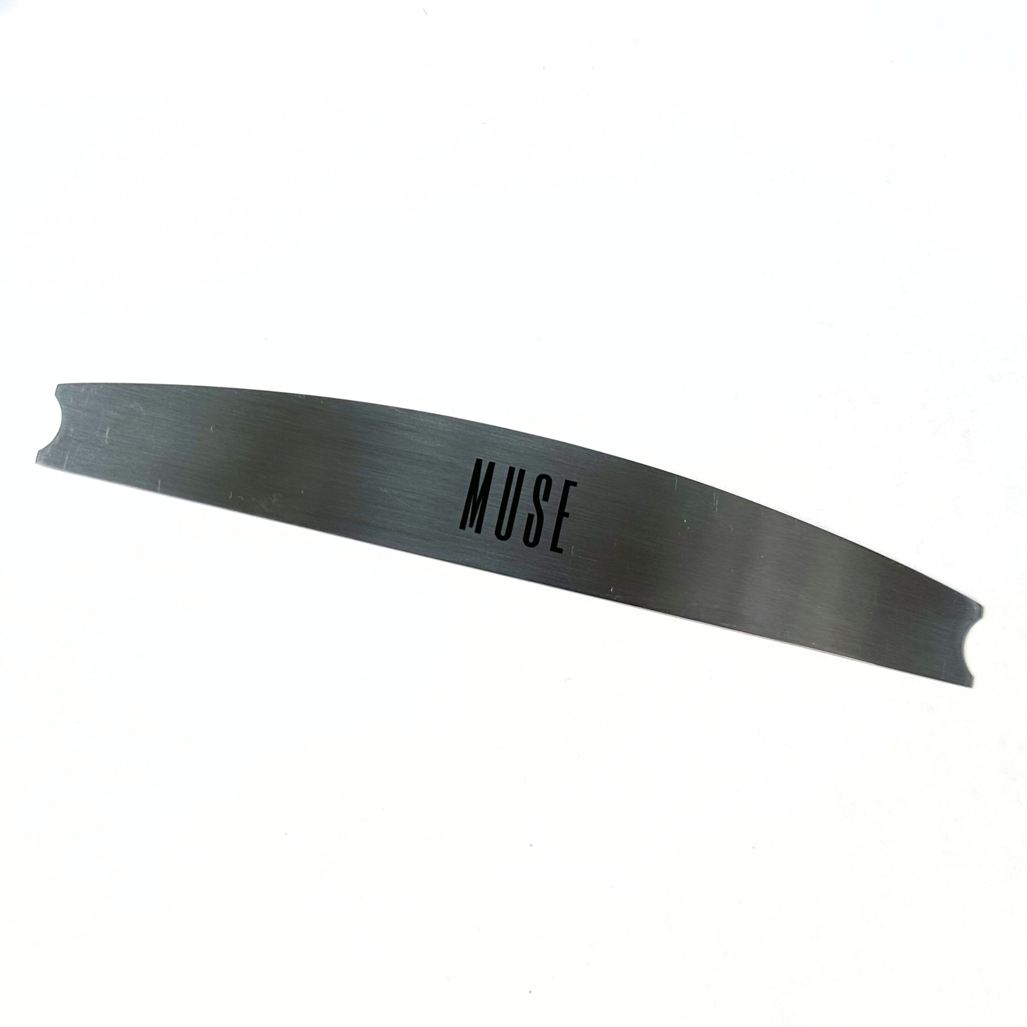 Metallic file base with 'MUSE' branding on a white background