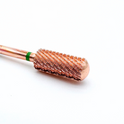 Rose gold barrel with black bristles on a white background